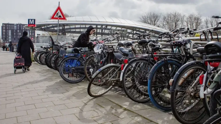 Bicycles parked at a station cycle park