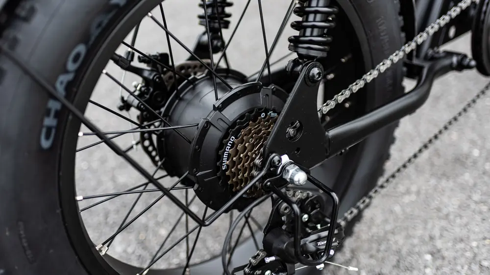 Close-up of an electric bike hub motor and gears