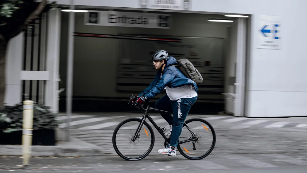 Urban cyclist commuting by bicycle