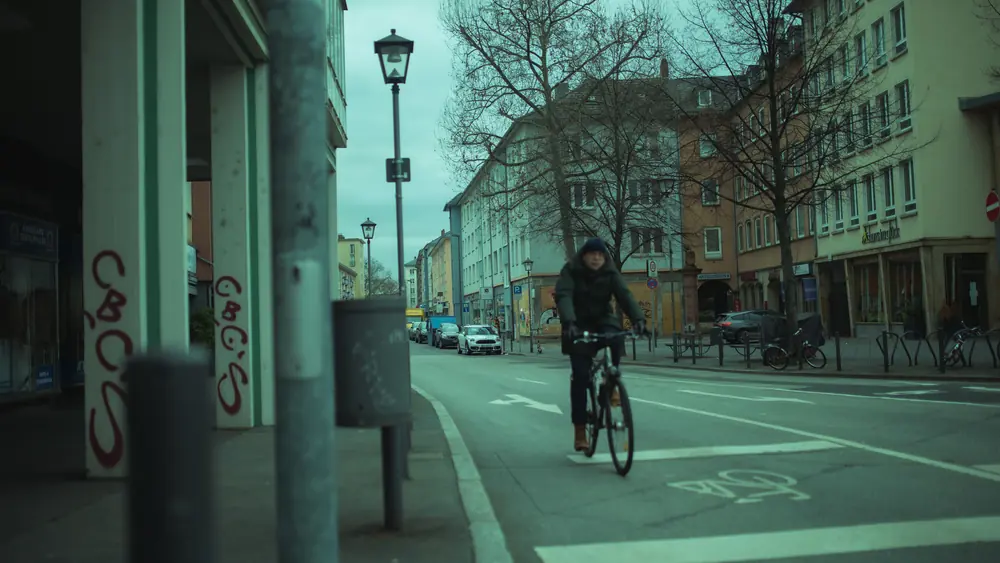 A cyclist riding in a bike lane