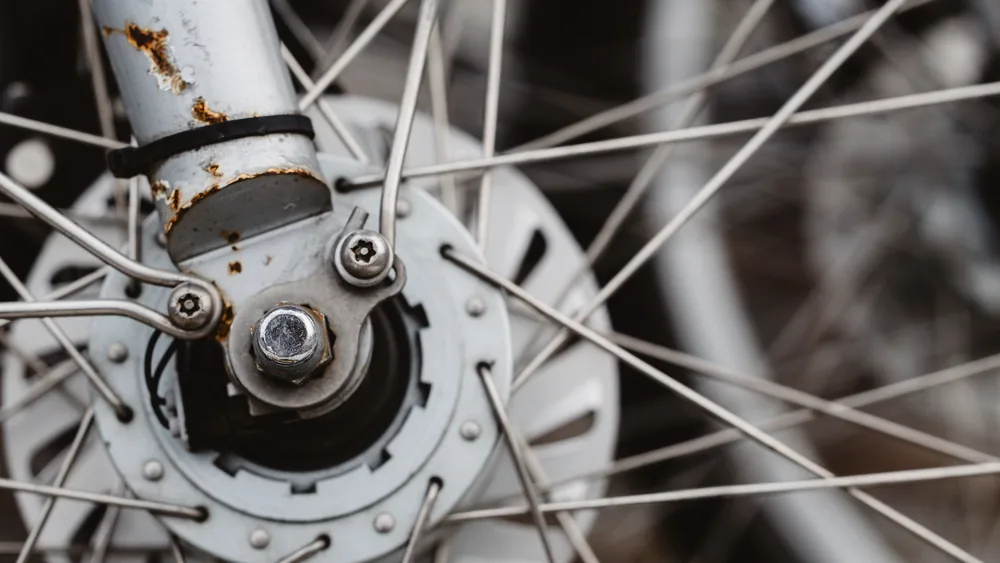 Close-up of a mudguard fitted to the rear wheel of a hybrid bike