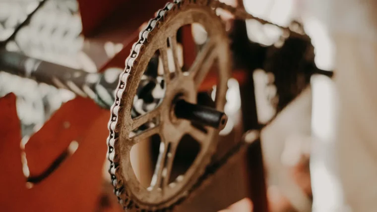 Close-up of a rusty chain on a bicycle chainring