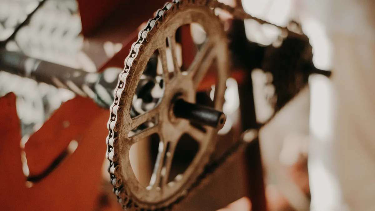 Close-up of a rusty chain on a bicycle chainring